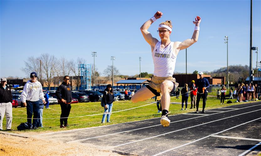 A student participates in the long jump
